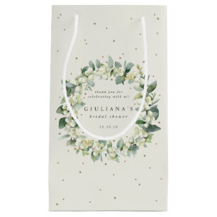 Elegant krämfärgad snöbärs- och eukalyptusbröllops