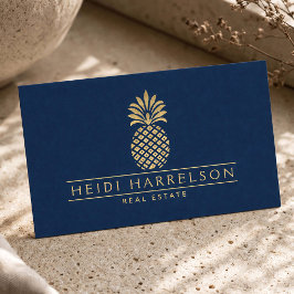 Elegant logotyp med guldananas på marinblå visitkort