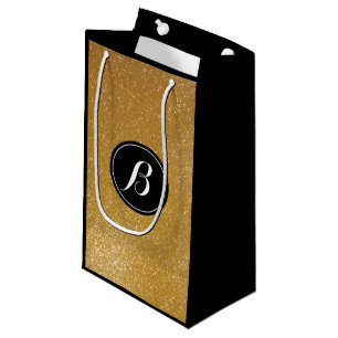 Elegant lyxpåse guld glitter i monogram