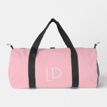 Elegant minimalistisk modern initial på pastellros