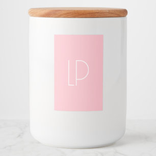 Elegant minimalistisk modern initial på pastellros mat etikett