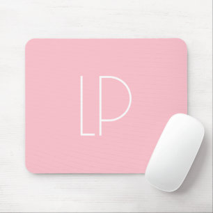 Elegant minimalistisk modern initial på pastellros musmatta