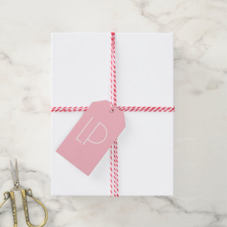 Elegant minimalistisk modern initial på pastellros presentetikett