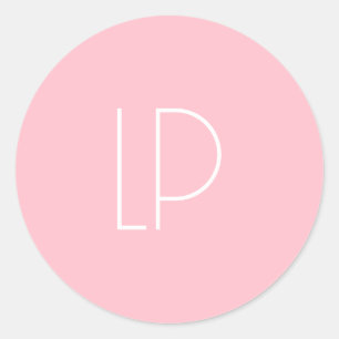 Elegant minimalistisk modern initial på pastellros runt klistermärke