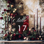 Elegant Moody Röd ros Blommigt Bordsnummer<br><div class="desc">Blev elegant för ditt gotiskinspirerade firande med vårt fängslande bröllop-bordsnummer-kort. En mjuk svart bakgrund ger perfekten arbetsyta för en fängslande, men underskattad bukett. Föreställ dig en arrangemang av muterat blod röd ros, där rikens röda nyanser blandas med mörk grönt löv. Den här eaterala designen utstrålar tyst sofistikering, perfekt för den...</div>