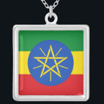 Elegant Necklace med Etiopiens Flagga Silverpläterat Halsband<br><div class="desc">Elegantens halsband i Etiopiens flagga är ett snyggt sätt att visa upp det nationella pridet. Designat med en förfinad och sofistikerad beröring, skapar den begynnande visningen Etiopiens pulanta färg och emblem, ett meningsfullt tillbehör för alla tillfälle. Vare sig det bär som en påstående biet eller en subtil hyllning till det...</div>