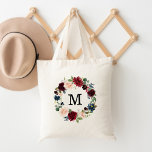 Elegant  och Burgundy Blommigt Utandning Monogram Tygkasse<br><div class="desc">Stärka ditt spel med snyggt Enchanted Blommigt personlig tote bags. Eleganten i säcken har ett monogram eller en inledande anpassningsbar omgiven av en brinnande, rosa och blommor i marinblått vattenfärg som fylls av lövning i lush grönt. Blommigtens utandning tote bags är perfekten för den blivande bruden, maid of honor, budens...</div>
