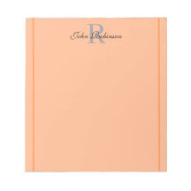 Elegant orangefärgad monogram anteckningsbok