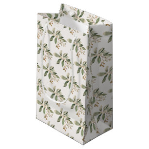 Elegant presentpåse med grönt kransmateriale