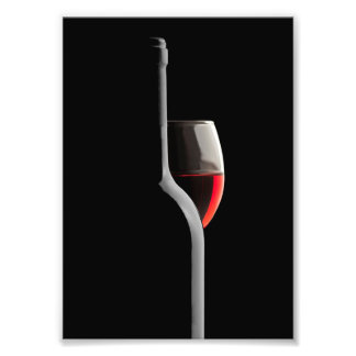 Elegant Red Wine Glass & Bottle. Black Background Fototryck