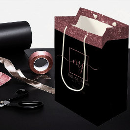 Elegant Ro Guld på svart mellanhandsbricka