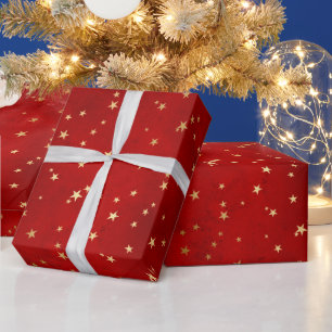 Elegant röd och gul julstjärnmönster presentpapper
