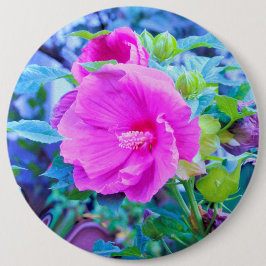 Elegant rosa hibiskusblomma med akvagrönt lövverk knapp