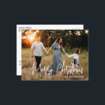 Elegant Script Photo Modern jul Helg Vykort<br><div class="desc">Modern vykort för fotopul med ett enkelt och minimalt format med hälsning "God jul" i ett vitt skript i eleganten tillsammans med din familj namn.</div>