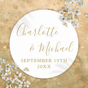 Elegant signaturskrift i guld runt klistermärke