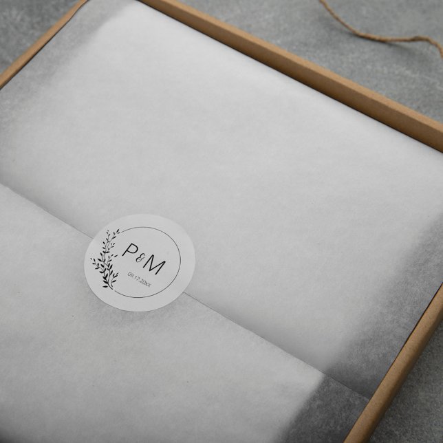 Elegant silhuett av löv runt klistermärke (Skapare uppladdad)