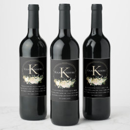 Elegant skräddarsydd familjenamnsmonogram med blom vinflaska etikett