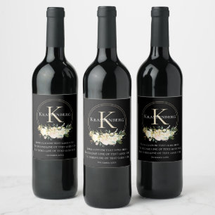 Elegant skräddarsydd familjenamnsmonogram med blom vinflaska etikett