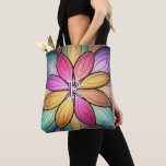 Elegant Stained‑Glass Floral Monogram Initial Tygkasse<br><div class="desc">This elegant tote bag features a vibrant stained‑glass–inspired floral design in rich multicolor jewel tones, personalized with a monogram initial for a polished, stylish touch. The bold colors and clean symmetry make it a standout everyday carryall — perfect for shopping, work, school, travel, or weekend outings. A thoughtful gift idea...</div>