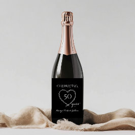 Elegant svart 50-årsjubileum med krans vinflaska etikett