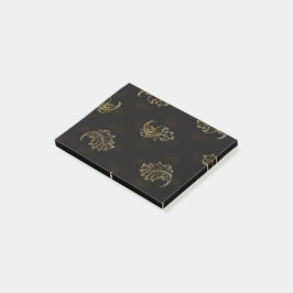 Elegant svart bakgrund med invecklad guldblad post-it block