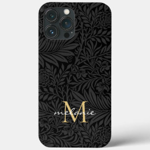 Elegant svart guld blommig scriptmonogram