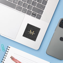 Elegant svart guld blommig scriptmonogram klistermärken