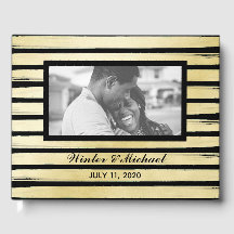 Elegant svart guldmålad randig vigsel