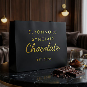 Elegant svart guldskrift choklad