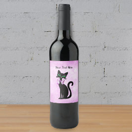 Elegant svart katt gröna ögon rosett ljus rosa vinflaska etikett