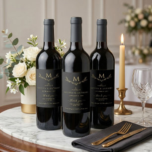 Elegant svart och guld monogram Krans Bröllop Vinflaska Etikett