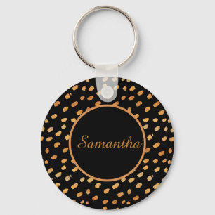 Elegant svart och guld monogram nyckelring