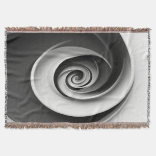Elegant svart och vit spiral abstrakt design, filt