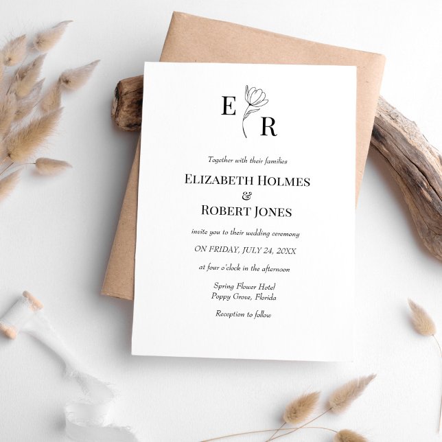Elegant Svartvit Blommigt Monogram Bröllop Inbjudningar (Elegant Black and White Floral Monogram Wedding Invitation on white table with neutral boho decor.)