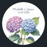 Elegant Trendy Watercolor Hydrangea Floral Wedding Runt Klistermärke<br><div class="desc">Capture the beauty and romance of your special day with this elegant wedding sticker. The delicate watercolor floral motif adds a touch of whimsy and sophistication to save-the-dates, invitations, favor tags, and more. Its classic round shape makes it the perfect finishing touch to elevate your wedding paper goods. Crafted with...</div>