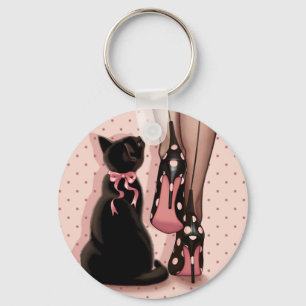 Elegant ung kvinna och svartkatt nyckelring