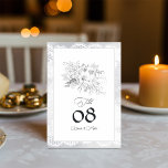 Elegant Vintage Snöre Blommigt Bröllop Bordsnummer<br><div class="desc">Lägg till en aning tidlös elegans till ditt bröllop bord med det här vintage-inspirerade bordsnumret-kortet. Den här utformningen har ett känsligt snöre gräns, en illustration av mjuk blommigt och en förfinad typografi, och är perfekt för vintage, formella eller romantiska bröllop teman. Anpassa med bordsnumren och namn för att skapa en...</div>