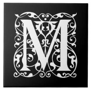 Elegant vit för brev M på svart Monogram Kakelplatta