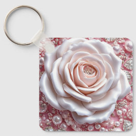 Elegant vit ros och gnistrande rosa pärlor nyckelring