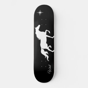 Elegant, vit silhuett på svart mini skateboard bräda 18,5 cm