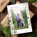 Elegant Winter Greenery Botanical White One Photo Julkort<br><div class="desc">Det här helgdag i eleganten har ett enda fotokort i lodrät som är inramat av vackra eucalyptus, holly och bär över en klassisk vit bakgrund. Den redigerbara hälsning på framsidan säger Glad helg. Kortets baksida är ett festligt rött färg. Du kan också lägga till ett annat foto och/eller ytterligare text...</div>
