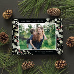 Elegant Winter Watercolor Greenery Botanical Photo Julkort<br><div class="desc">This elegant holiday photo card features a single horizontal photo framed by beautiful watercolor eucalyptus, holly, and berries over a chic black background. The editable greeting on the front says "Happiest Holidays". The back of the card is a simple black background to which you can add another photo and/or additional...</div>