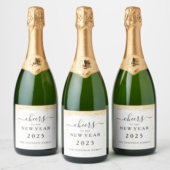 Eleganta fizzbubblor jublar på nyårsafton (Flaskor)