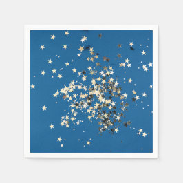 Eleganta guldglittrande stjärnor på blå pappersser pappersservett
