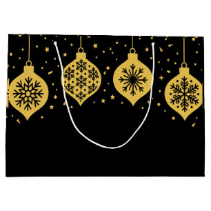 Eleganta julgranprydnader i guld på svart