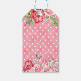 Eleganta rosa & röda rosor på rosa bakgrund med hj presentetikett