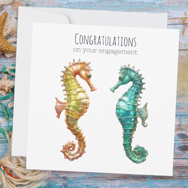 Eleganta söta sjöhästar Engagerat par Förlovning Kort (An engagement card with a picture of two sea horses, one yellow and one turquoise)