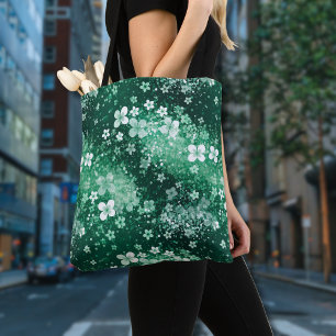 Eleganta vita gröna shamrockar och prickar på mörk tygkasse