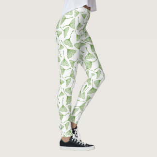 Eleganta vita leggings med grönt ginkgoblad