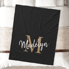 Eleganten Feminine Chic med svart monogram Guld Fleecefilt